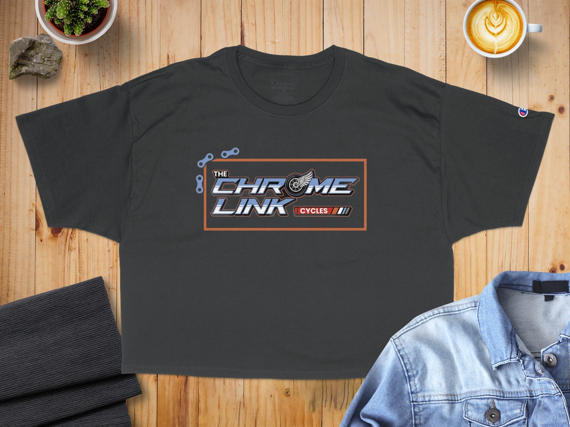 Charcoal t-shirt with "The Chrome Link Cycles" logo and motorcycle chain graphic.