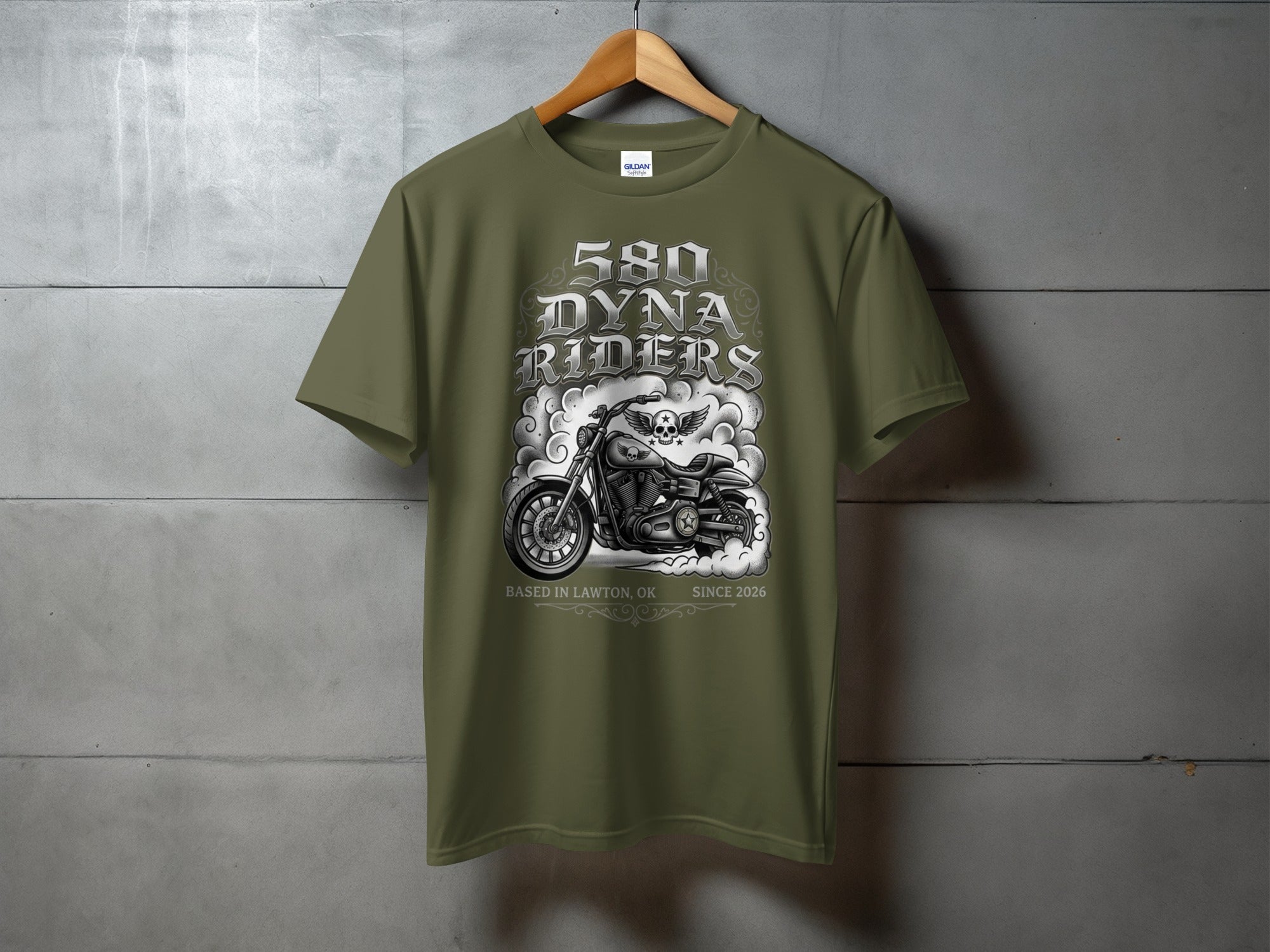 Green t-shirt with "580 DYNA RIDERS" text and motorcycle graphic.