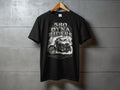 Black t-shirt with "580 DYNA RIDERS" graphic, motorcycle, skull, and text.